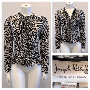 JOSEPH RIBKOFF beautiful animal print zip up top with sequin details and ruffle